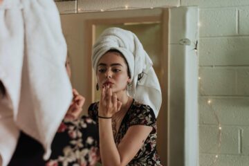 a young woman doing a beauty skincare routine for fresh healthy glowing natural skin