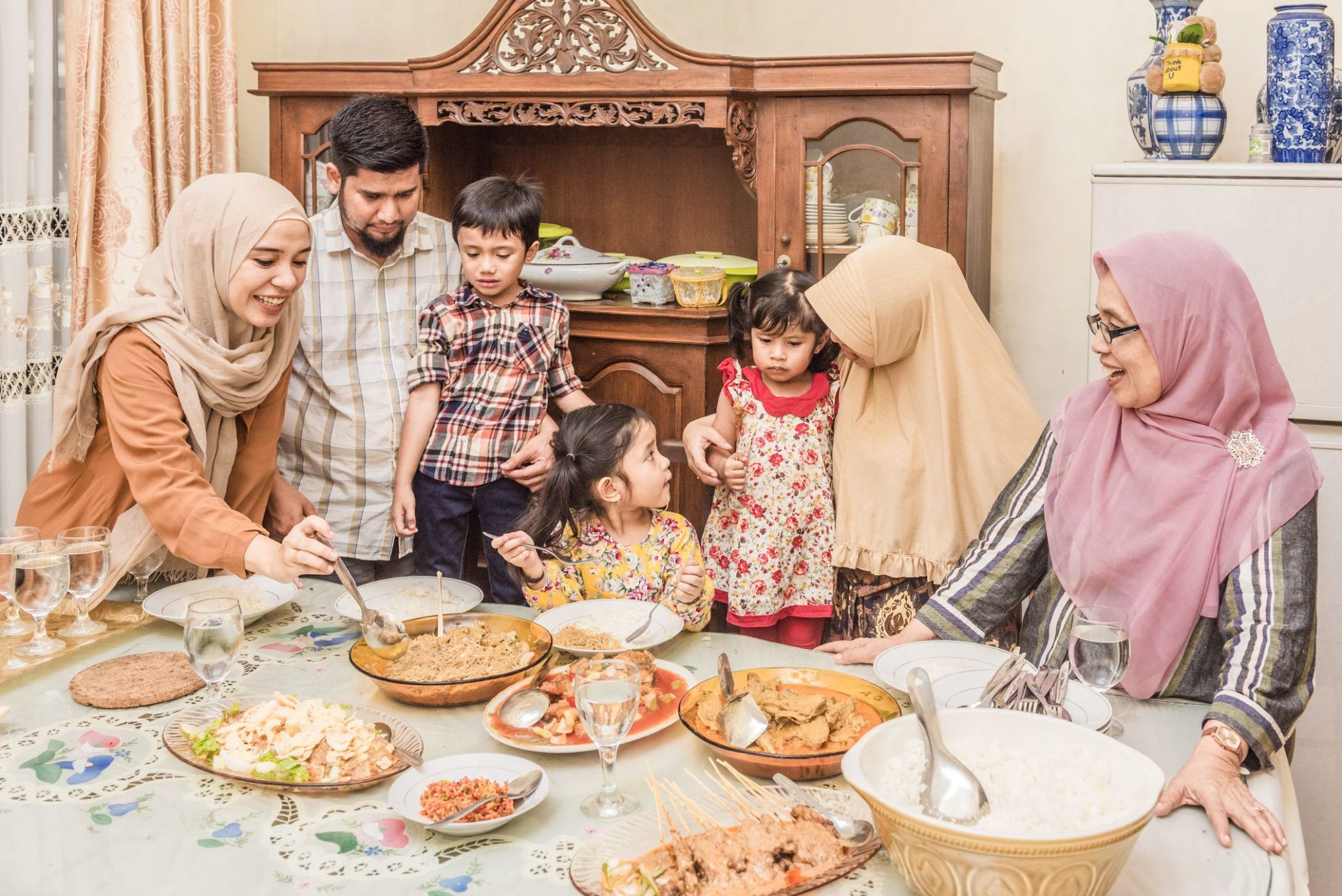 A Muslim family celebrating Eid-Al-Fitr.