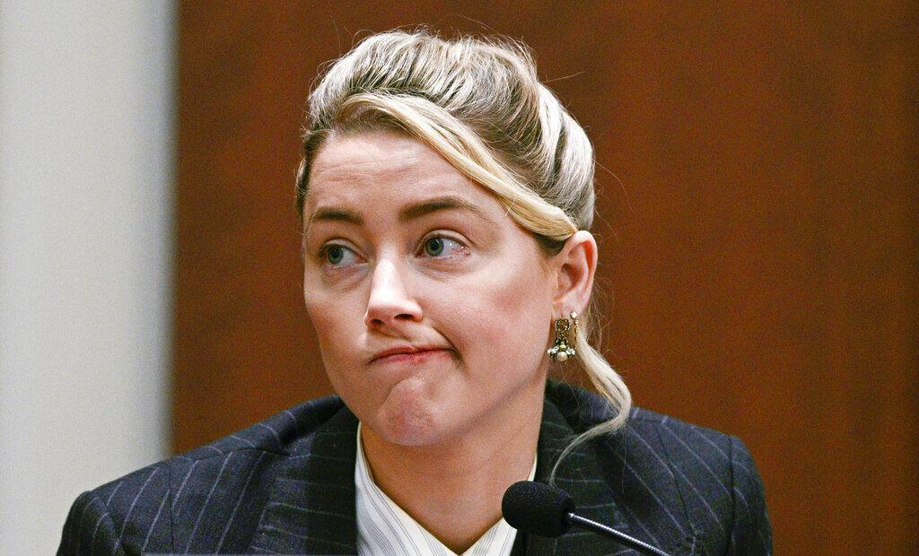 Actor Amber Heard testifies in the courtroom at the Fairfax County Circuit Courthouse in Fairfax, Va., Tuesday, May 17, 2022. Actor Johnny Depp sued his ex-wife Amber Heard for libel in Fairfax County Circuit Court after she wrote an op-ed piece in The Washington Post in 2018 referring to herself as a "public figure representing domestic abuse."