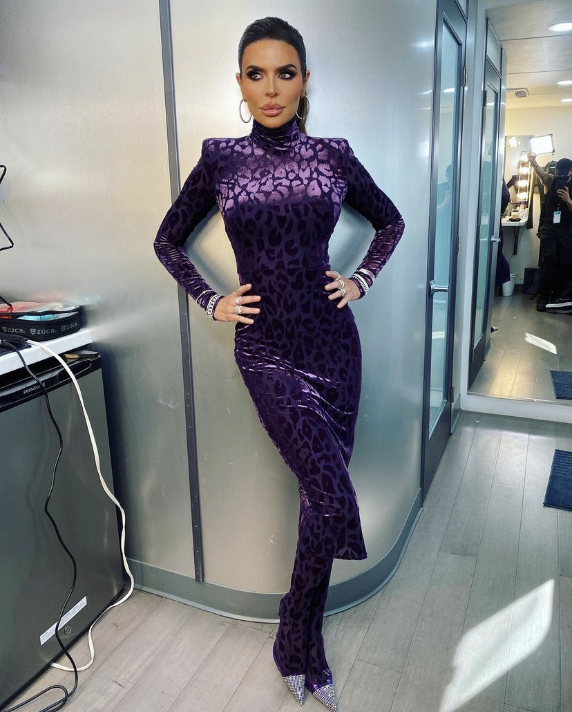Lisa Rinna in a purple, leopard print dress