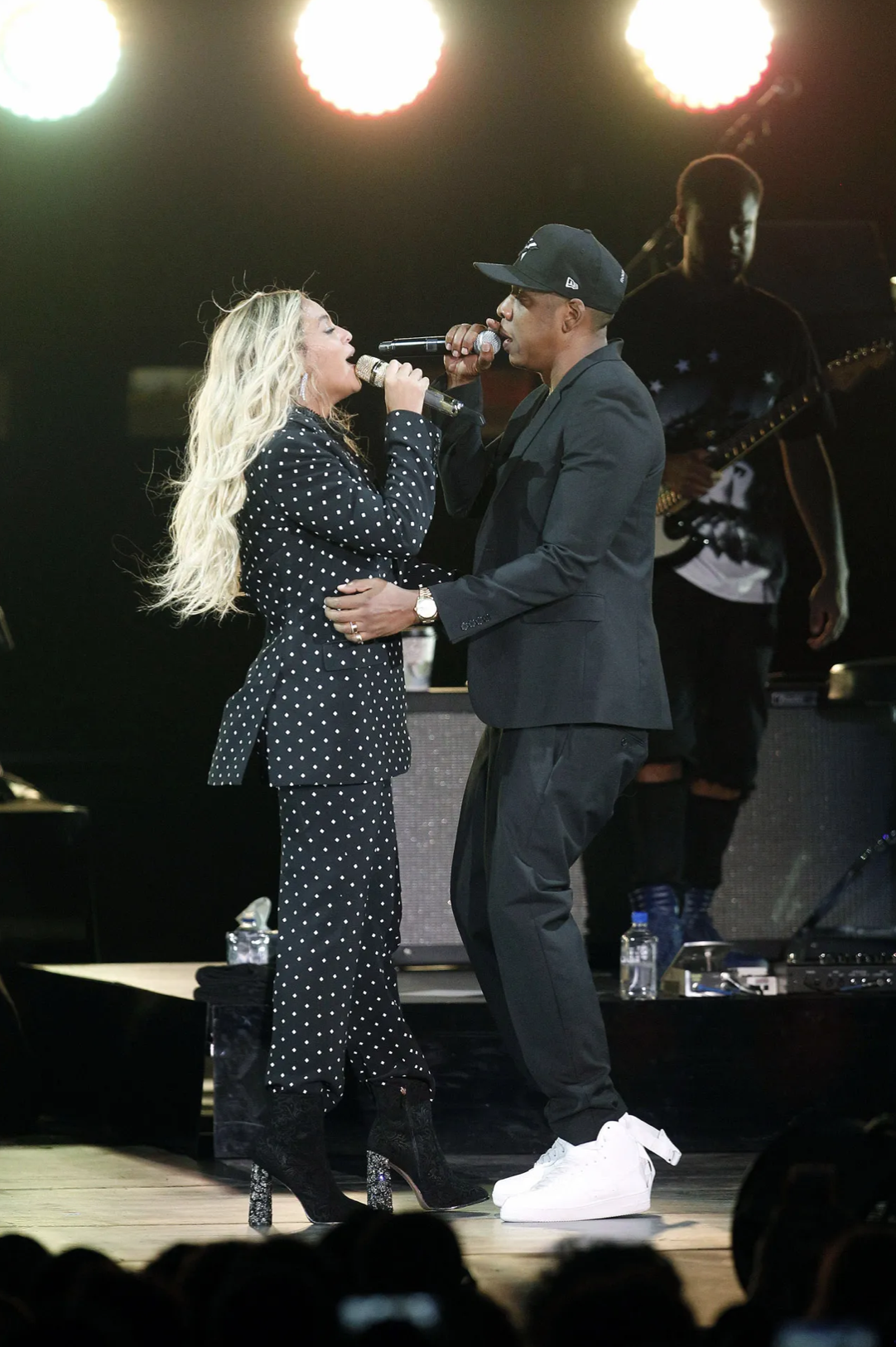 Jay-Z singing on stage with wife, Beyoncé