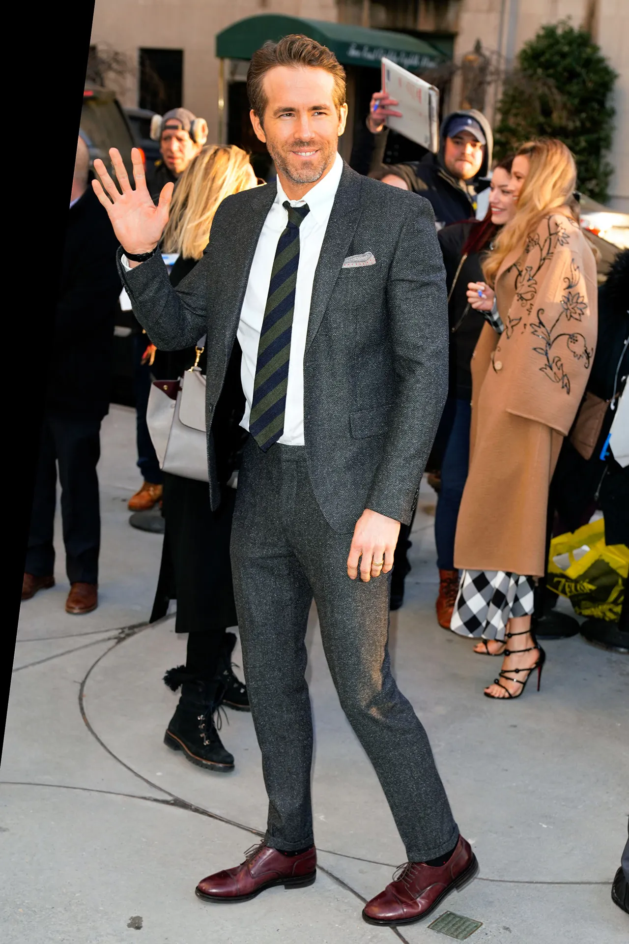Ryan Reynolds in a tweed suit.