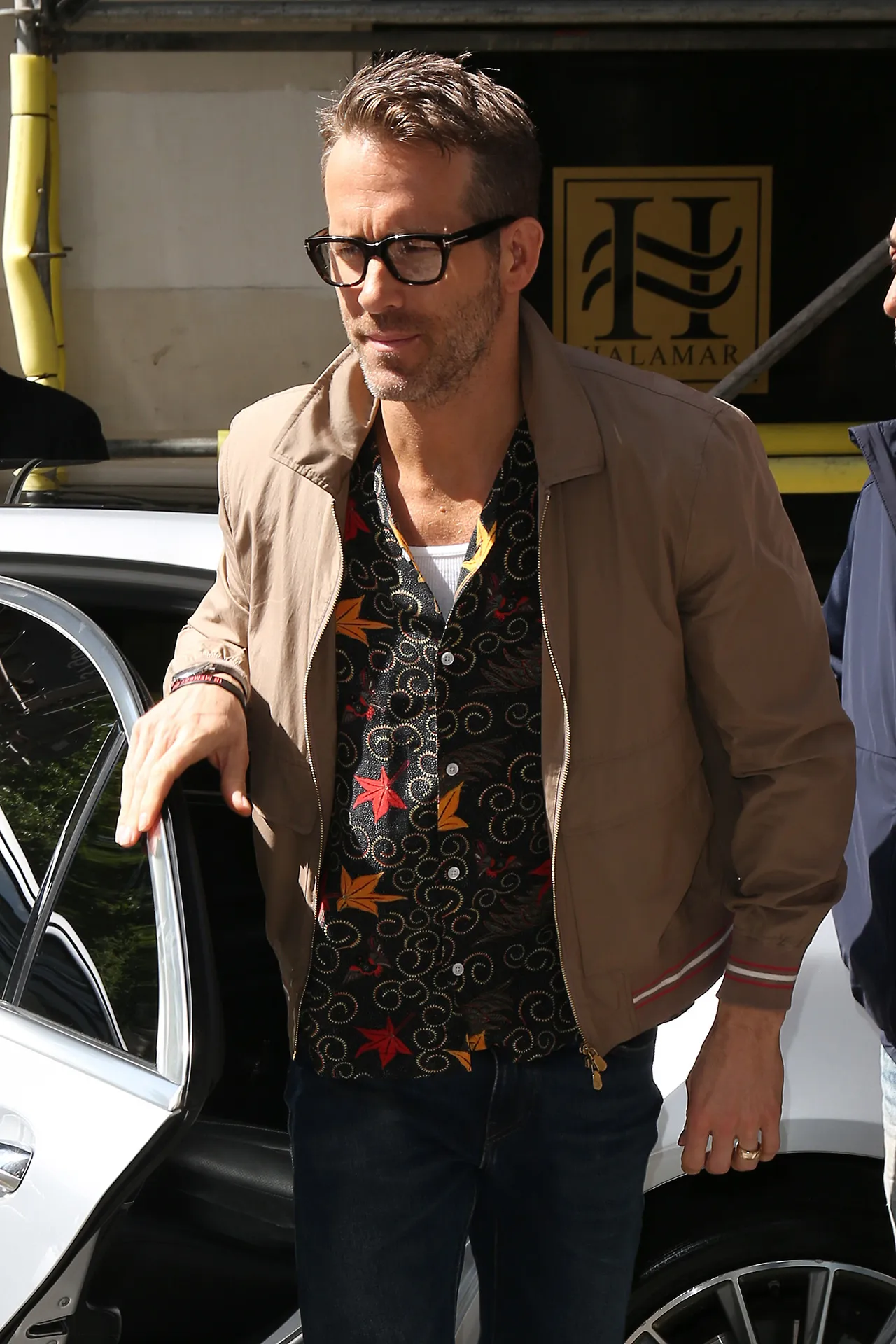Ryan Reynolds in a unique shirt.