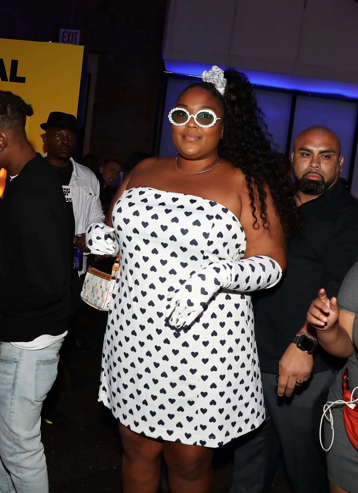 Lizzo in a dress full of hearts.