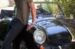 Mcdreamy, aka Patrick Dempsey, poses with his classic high end car