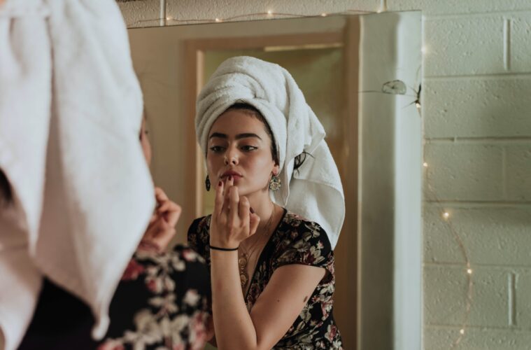 a young woman doing a beauty skincare routine for fresh healthy glowing natural skin