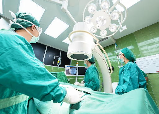 scrub nurses in the OR prepping a lyposuction 