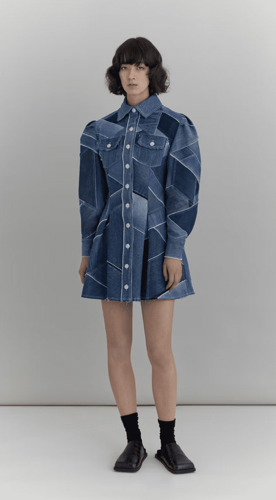 model wearing blue jean geometic dress