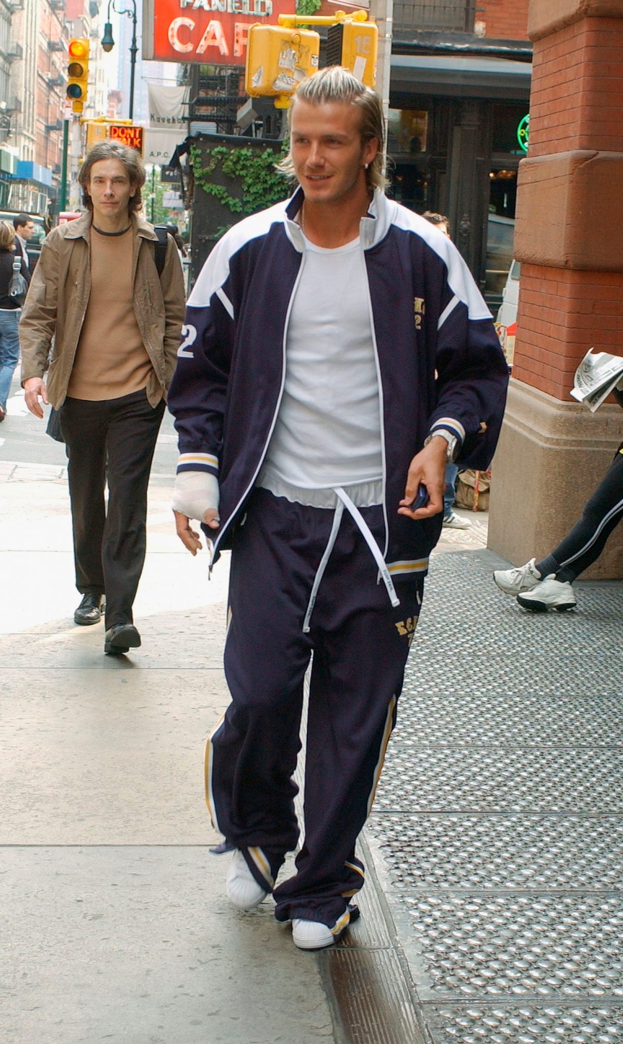 David Beckham walking on the street