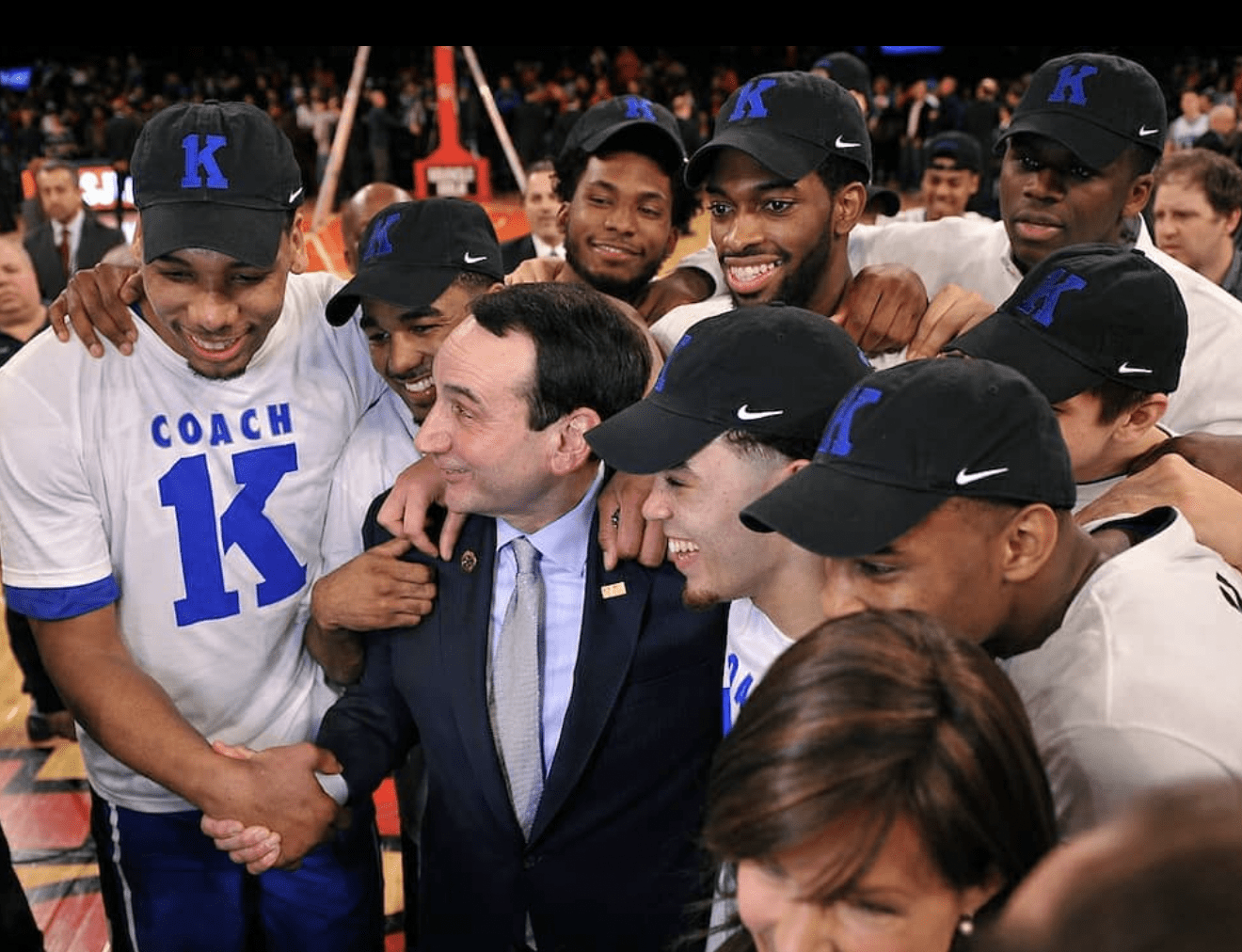 Coach K and Basketball Players