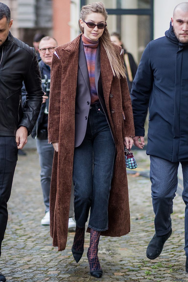 Gigi Hadid looking cozy on the street.