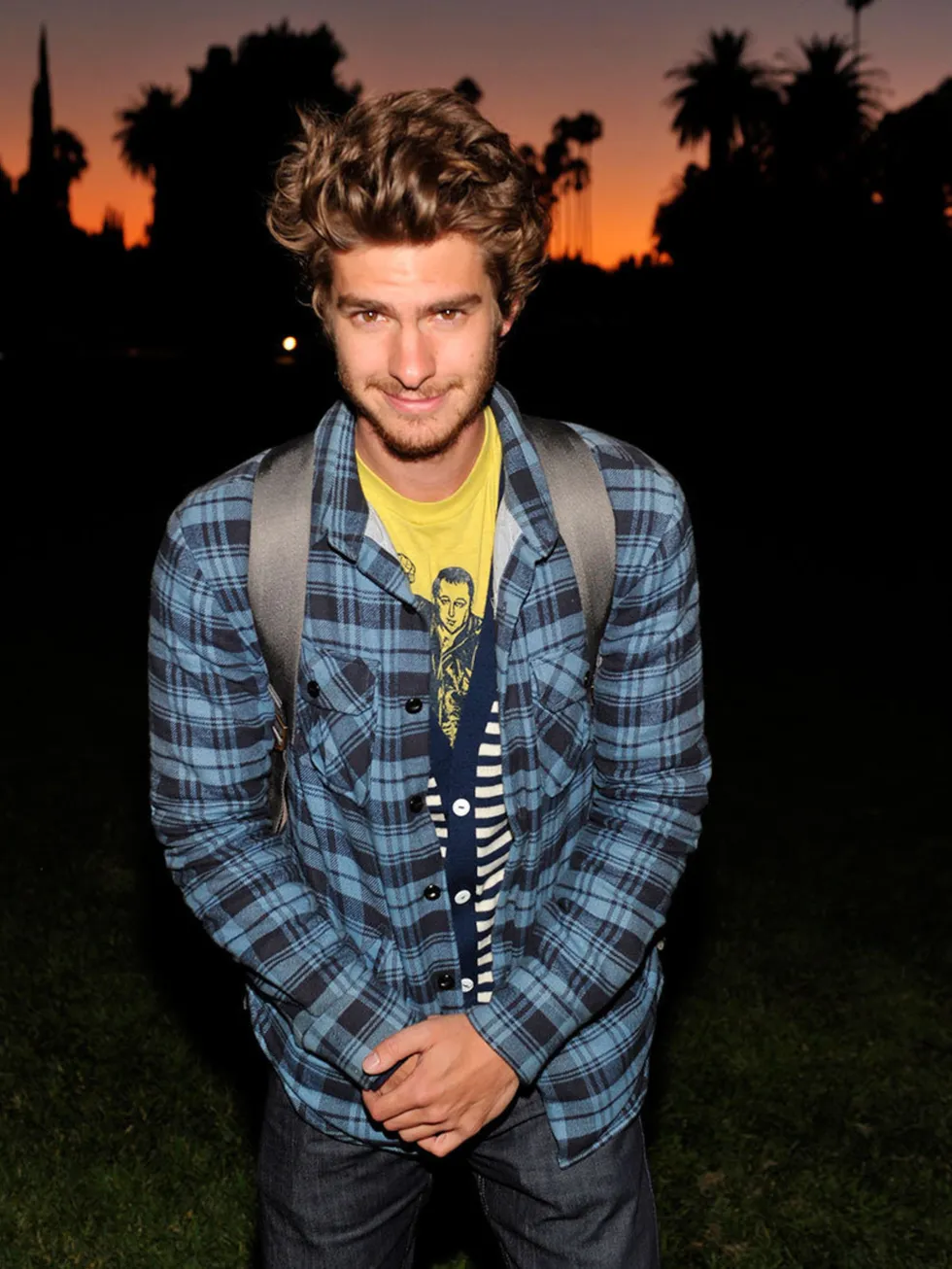 Andrew Garfield with a school bag on.