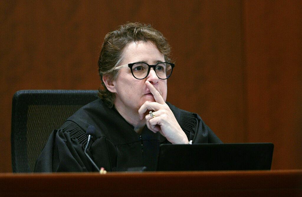 Judge Penney Azcarate listens in the courtroom at the Fairfax County Circuit Courthouse in Fairfax, Va., Tuesday, May 17, 2022. Actor Johnny Depp sued his ex-wife Amber Heard for libel in Fairfax County Circuit Court after she wrote an op-ed piece in The Washington Post in 2018 referring to herself as a "public figure representing domestic abuse."