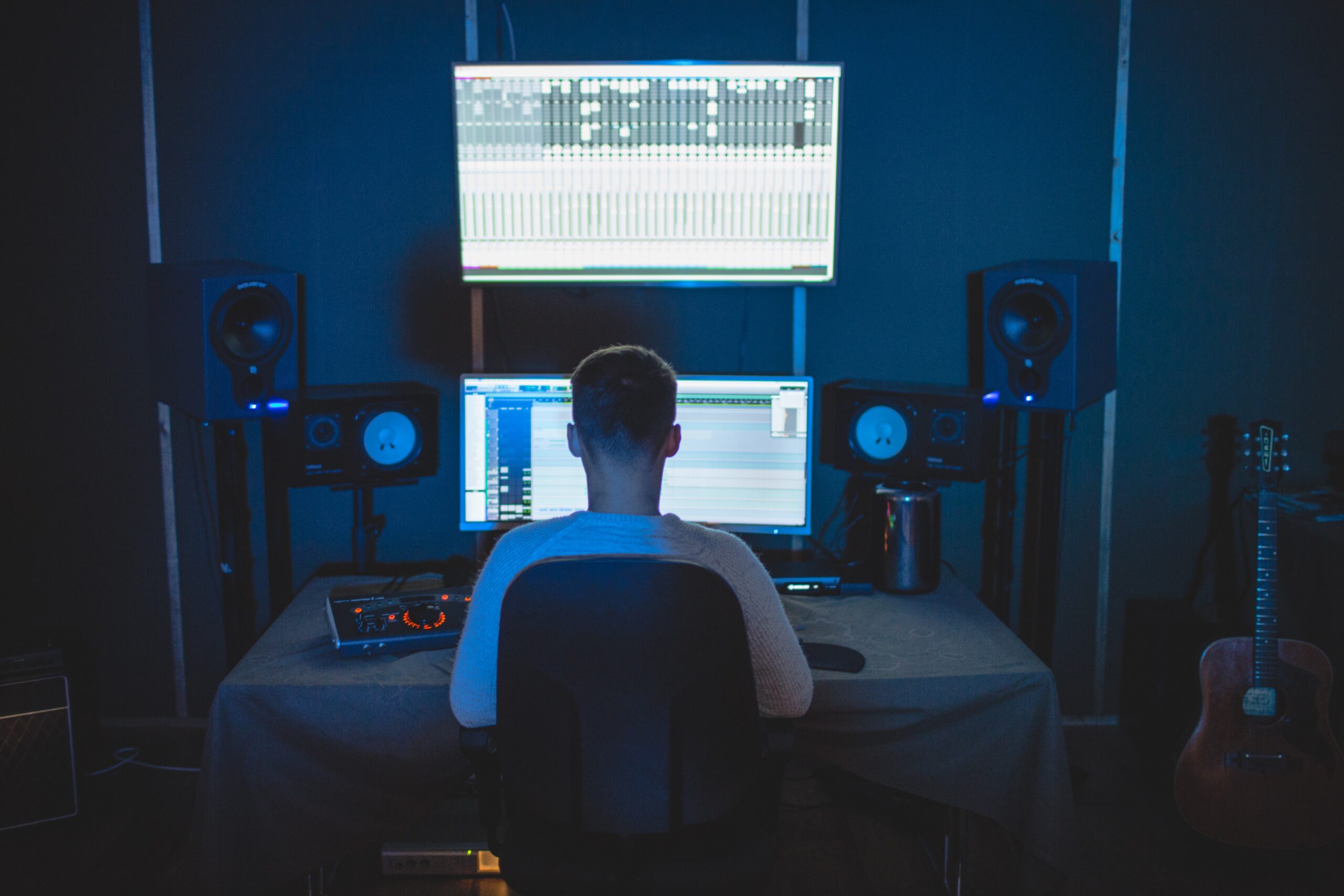 Blue tinted studio - working on music