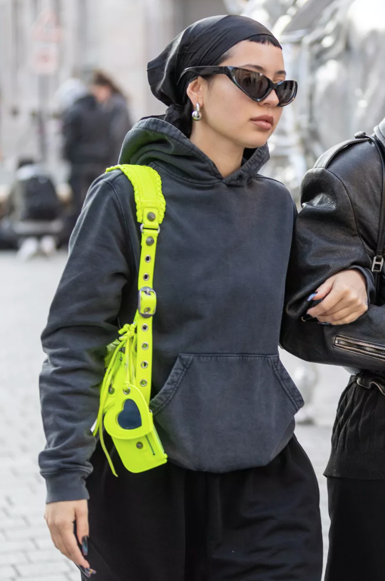 Alexa Demie wearing neon green Le Cagole bag
