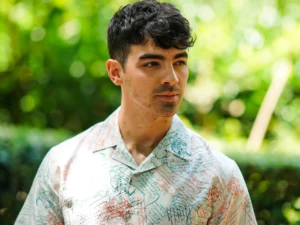 Joe Jonas in a tropical shirt