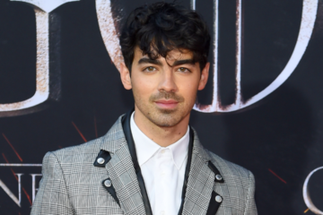 Joe Jonas in a gray suit
