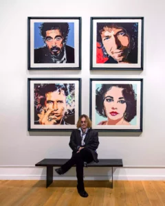Johnny Depp with the first 4 paintings in his collection.