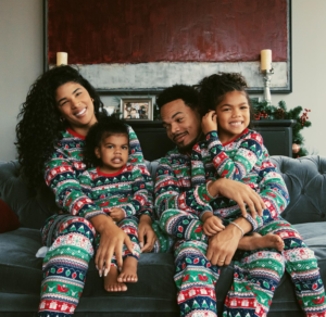 Kirsten Corley-Bennet and Chance the Rapper with daughters