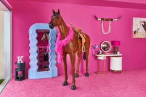 In the DreamHouse bedroom there's a plastic life-size horse with a pink boa on.