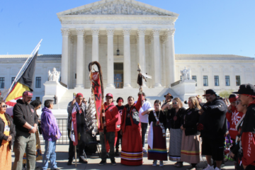 Native Americans hold protest outside the Supreme Court house in their tribal garb