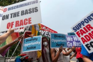People protest outside of the Supreme Court in Washington after affirmative action was turned down by the Supreme Court