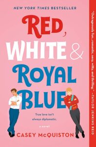 'Red White & Royal Blue' book cover. Each word is in it's corresponding color and they're written on a pink background with cartoons of the two main characters below.