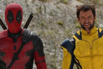 A close up of Ryan Reynolds as 'Deadpool' walking with Hugh Jackman as 'Wolverine' in an official photo from 'Deadpool 3'