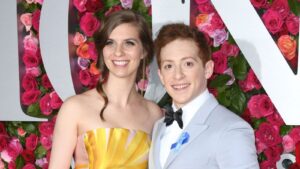 Lilly Jay (left) and Ethan Slater (right) posing on the red carpet for the Tonys.