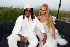Beyoncé and Jay Z in white at Michael Rubin's Fourth of July white party.