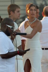 Hailey and Justin Bieber talking at Michael Rubin's Fourth of July White Party.