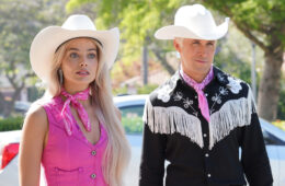 Barbie (left) in her pink cowgirl outfit and Ken (right) in his black and silver cowboy outfit