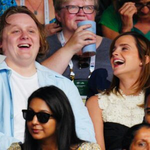 Lewis Capaldi (left) Emma Watson (right) laughing together in the audience at Wimbledon women's finals 2023