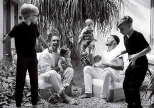 Ricky Martin and Jwan Yosephy playing with their four young children in their backyard.