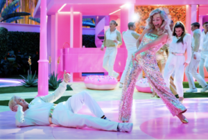 Barbie (right) and Ken (left) dancing at a party at Barbie's Dream house