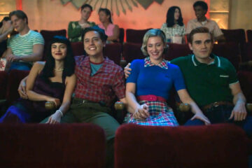 (from left to right)Veronica, Jughead, Betty and Archie sitting next to each other in a movie theater