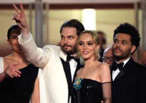 Sam Levinson (left) Lily-Rose Depp (middle) and Abel / The Weekend (right) at the premiere of 'The Idol' at Cannes Film Festival