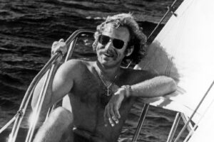 Jimmy Buffett poses for a photo in his sailboat circa 1975 in Key West, Florida