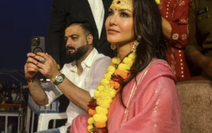 Sunny Leone attends Ganga Aarti with Abhishek Singh in Varanasi