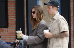Hailey and Justin Bieber pushing a stroller. Fans wait to see Jack Blues Bieber