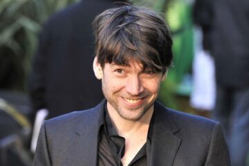 Alex James Causes Stir at Church Christmas Party