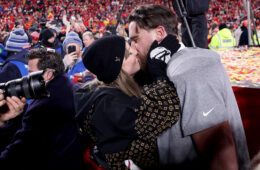 Taylor Swift and Travis Kelce Celebrate Win with On-Field Kiss