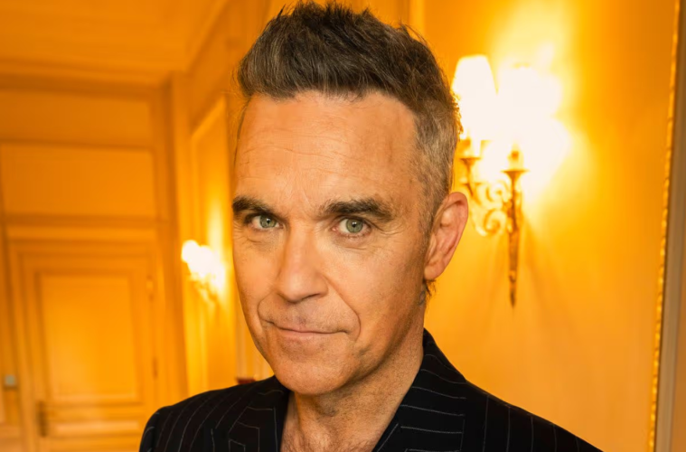 Robbie Williams breaks Beatles’ UK No. 1 albums record