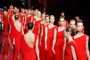 Valentino Fashion Show of models in red dresses