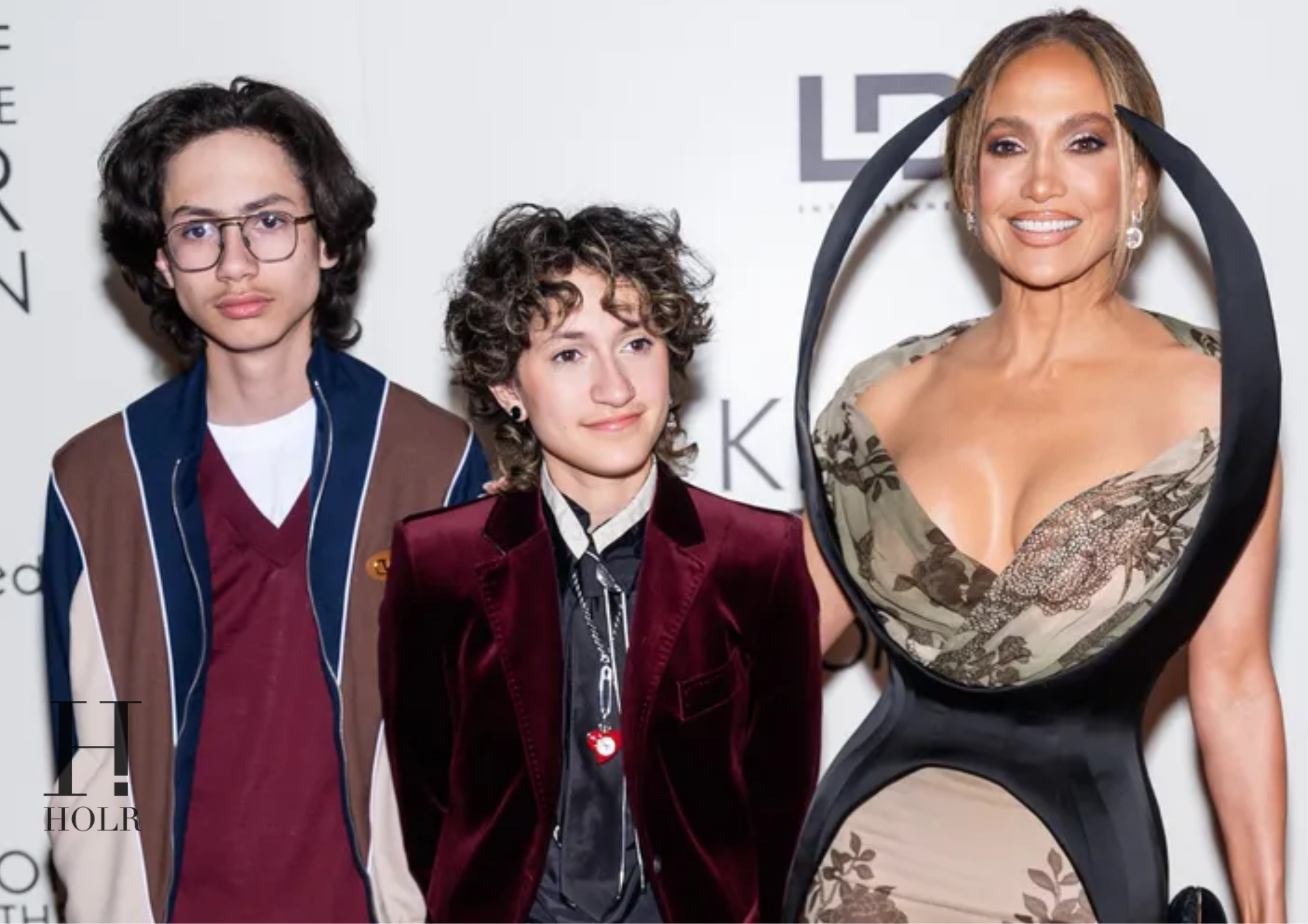 Jennifer Lopez Marks Twins’ 18th in Chic Pink Slip Dress