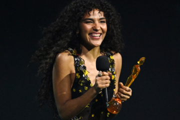 Olivia Dean’s Sheer Dress Shines at BRIT Awards