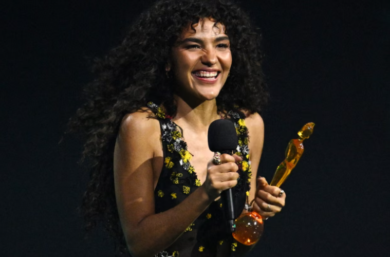 Olivia Dean’s Sheer Dress Shines at BRIT Awards