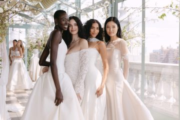 Models at the Sarah Seven Presentation for Bridal Fashion Week. Standing together in a bright terrace in bridal gowns