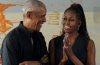 Barack and Michelle Obama smiling together while discussing the perfect date night at the Obama Presidential Center in Chicago.