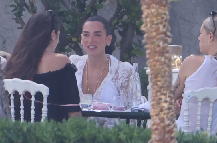 Dua Lipa Stuns In White Lace Dress After Wedding